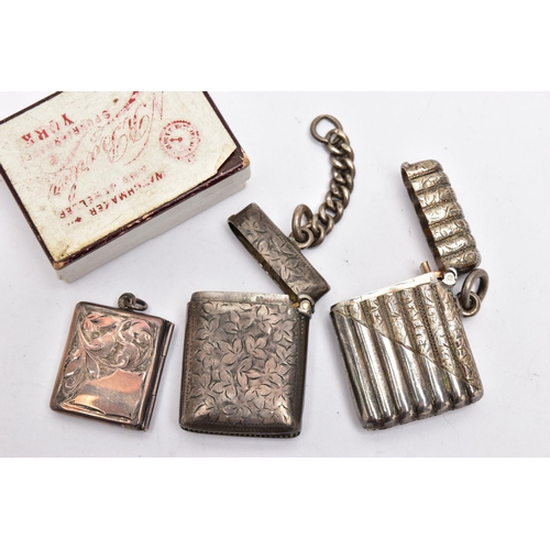 40 - TWO SILVER VESTA CASES AND A STAMP HOLDER, the first vesta of a rectangular form, decorated with a f... 