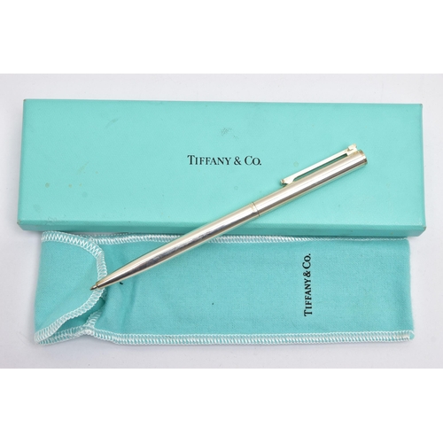 42 - A BOXED 'TIFFANY & CO' BALL POINT PEN, polished white metal pen, signed 'Tiffany & Co, Germany' and ... 