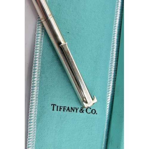 42 - A BOXED 'TIFFANY & CO' BALL POINT PEN, polished white metal pen, signed 'Tiffany & Co, Germany' and ... 