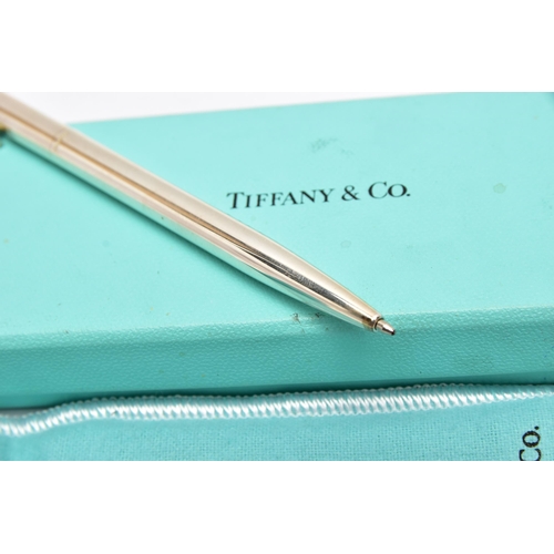 42 - A BOXED 'TIFFANY & CO' BALL POINT PEN, polished white metal pen, signed 'Tiffany & Co, Germany' and ... 