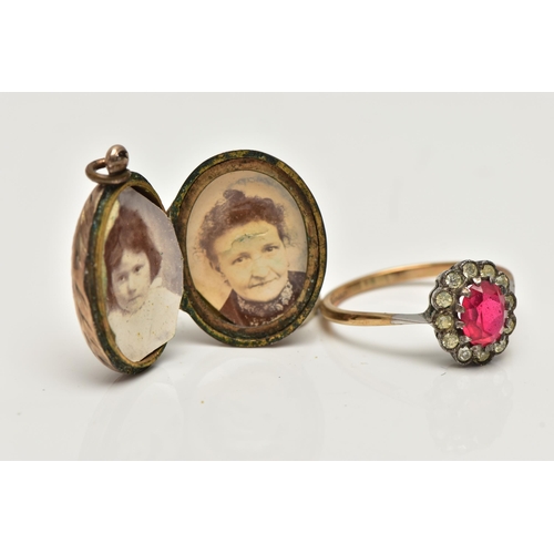 46 - A LOCKET AND A RING, the gold front and back, oval hinged locket with floral pattern and vacant cart... 