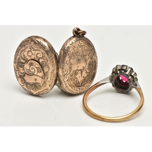 46 - A LOCKET AND A RING, the gold front and back, oval hinged locket with floral pattern and vacant cart... 