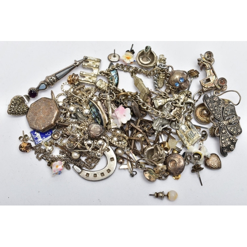 64 - AN ASSORTMENT OF WHITE METAL JEWELLERY, to include a Scottish brooch, chain necklaces, two charm bra... 