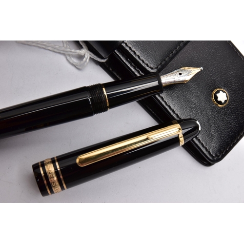 79 - A TWO PIECE 'MONTBLANC' PEN SET, to include a black laquaer with gold detailed coller, fountain pen,... 