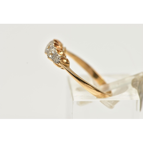 8 - A YELLOW METAL FIVE STONE DIAMOND RING, set with five graduated old cut diamonds, estimated total di... 