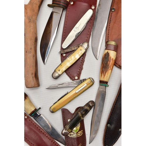 87 - FOUR SHEATH KNIVES WITH SHEATHS, the first by Rostrei Soligen, two by J Howell & Sons, Sheffield, an... 