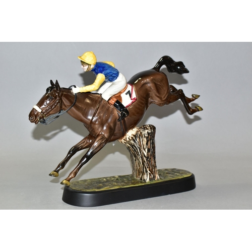 303 - A BESWICK STEEPLECHASER 2505 FIGURE, of a jockey and racehorse jumping a fence, printed black crest ... 