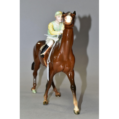 304 - A BESWICK RACEHORSE AND JOCKEY (WALKING RACEHORSE) 1037 FIGURE, colourway no 2, the jockey wearing p... 