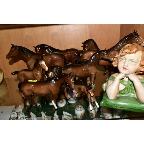 310 - AN EARLY 20TH CENTURY FRENCH PAINTED PLASTER BUST OF A YOUNG GIRL AND EIGHT BESWICK BROWN GLOSS HORS... 