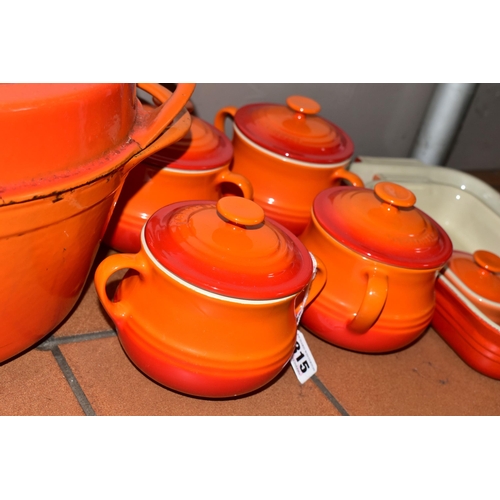 315 - A GROUP OF LE CREUSET AND OTHER COOKWARE, to include five Le Creuset orange stoneware covered soup/b... 