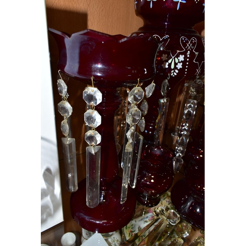 319 - THREE CRANBERRY GLASS LUSTRES, VASES AND SPARE LUSTRE DROPS, comprising a single cranberry glass lus... 