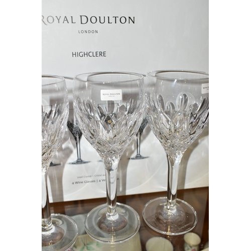 320 - A BOXED SET OF FOUR ROYAL DOULTON CRYSTAL WINE GLASSES, in the 'Highclere' pattern (4 + box) (Condit... 