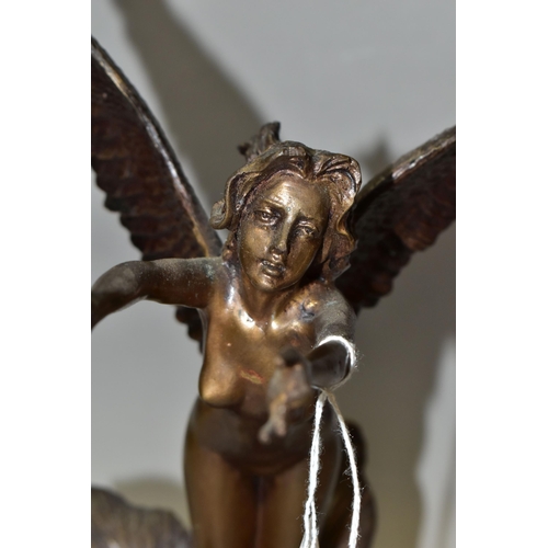 325 - A BRONZED FIGURE OF A FAIRY, standing, with her arms outstretched, inside a flower, indistinctly sig... 