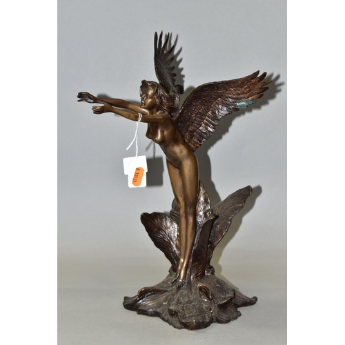 325 - A BRONZED FIGURE OF A FAIRY, standing, with her arms outstretched, inside a flower, indistinctly sig... 