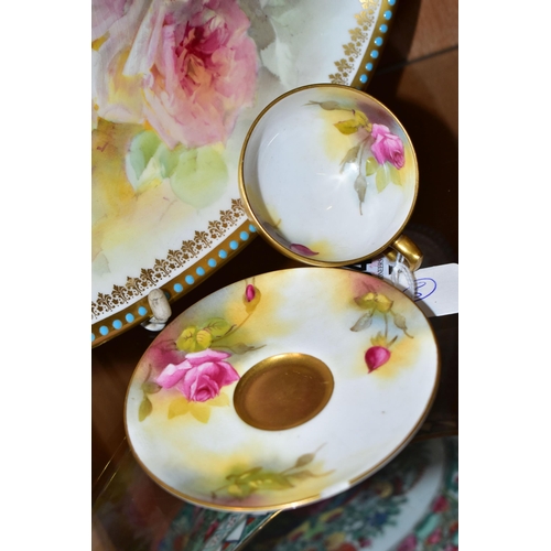 334 - A ROYAL WORCESTER TEACUP AND SAUCER, AND A ROYAL DOULTON BOWL, PAINTED WITH ROSES, the small teacup ... 