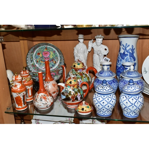 338 - A GROUP OF ORIENTAL CERAMICS, to include two Blanc de Chine figurines, height 25.5cm (some losses to... 