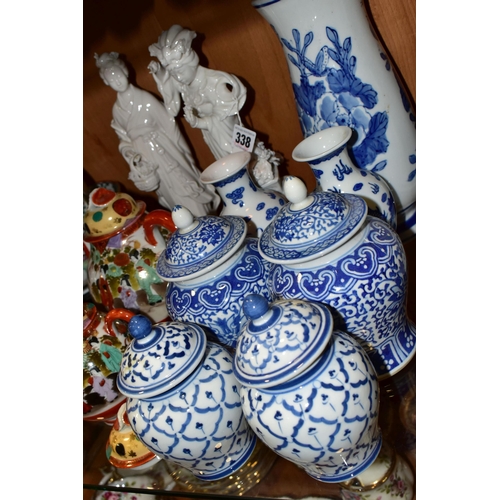 338 - A GROUP OF ORIENTAL CERAMICS, to include two Blanc de Chine figurines, height 25.5cm (some losses to... 