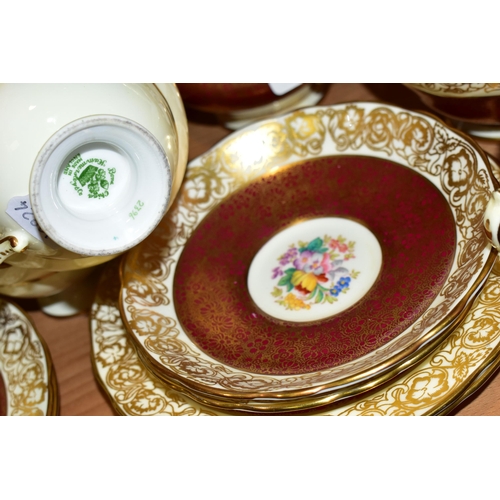 339 - A TWENTY ONE PIECE HAMMERSLEY TEA SET, in pattern 2396, with red and gilt borders around a central p... 