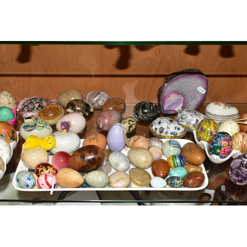 346 - A LARGE COLLECTION OF MARBLE AND CERAMIC EGGS, comprising three Fabergé style eggs, sixteen stone/ma... 