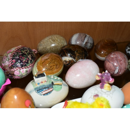 346 - A LARGE COLLECTION OF MARBLE AND CERAMIC EGGS, comprising three Fabergé style eggs, sixteen stone/ma... 