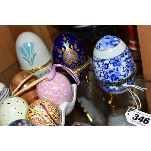 346 - A LARGE COLLECTION OF MARBLE AND CERAMIC EGGS, comprising three Fabergé style eggs, sixteen stone/ma... 