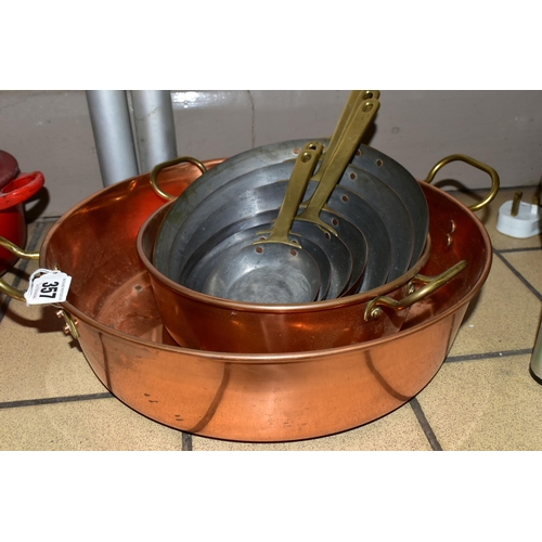 357 - A GROUP OF COPPER SAUCEPANS, to include two large copper pans, diameter 24cm and 34cm, together with... 