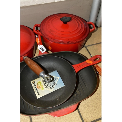 358 - A SET OF LE CREUSET 'CERISE' LIDDED SAUCEPANS AND COOKWARE, comprising three graduated covered sauce... 