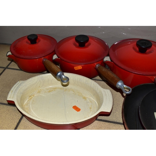 358 - A SET OF LE CREUSET 'CERISE' LIDDED SAUCEPANS AND COOKWARE, comprising three graduated covered sauce... 