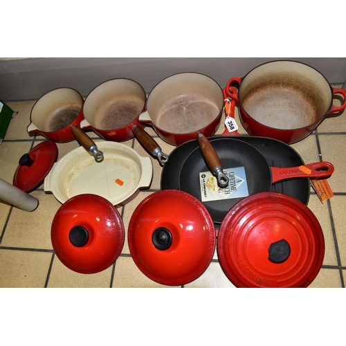 358 - A SET OF LE CREUSET 'CERISE' LIDDED SAUCEPANS AND COOKWARE, comprising three graduated covered sauce... 