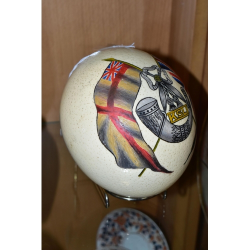 378 - A PAINTED OSTRICH EGG, with the regimental insignia of King's Shropshire Light Infantry (1) (Conditi... 