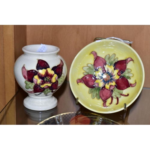 382 - TWO MOORCROFT POTTERY 'COLUMBINE' PATTERN PIECES, comprising a pedestal dish decorated with a purple... 