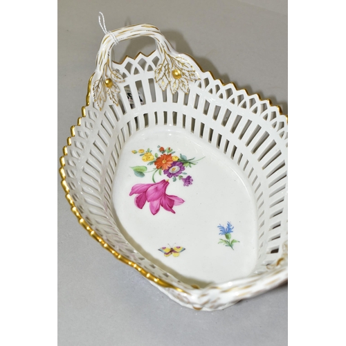 393 - A 20TH CENTURY KPM BERLIN RETICULATED TWIN HANDLED BASKET OF SHAPED OVAL FORM, painted with flowers ... 