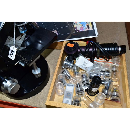 402 - WILD HEERBRUGG M12 BINOCULAR MICROSCOPE, complete with wooden box, Kohler lamp and box of accessorie... 