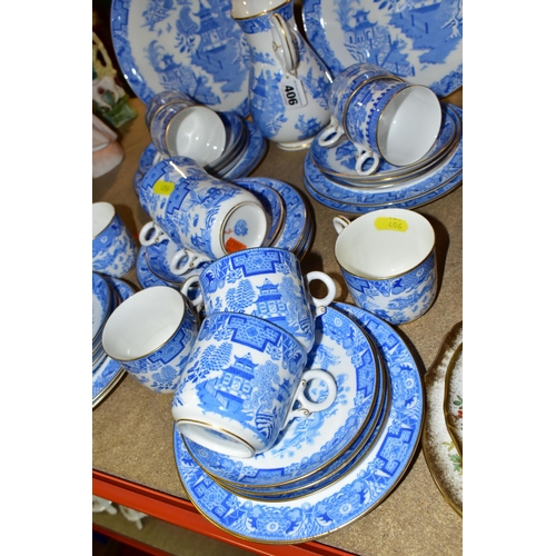 406 - A SET OF ROYAL WORCESTER BLUE AND WHITE 'WILLOW' PATTERN TEAWARES B389, comprising two cake plates, ... 