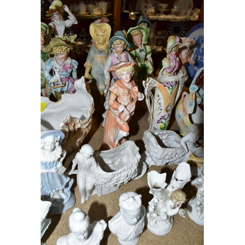 407 - A QUANTITY OF GERMAN BISQUE FIGURINES, comprising a pair of Staffordshire figural posy vases (missin... 