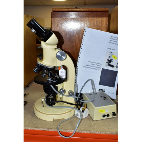 416 - WILD HEERBRUGG M11 BINOCULAR MICROSCOPE, complete with wooden box Kohler lamp and power supply? unte... 