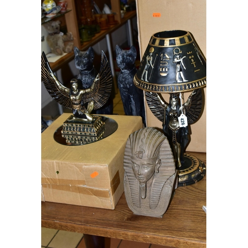 426 - A GROUP OF EGYPTIAN THEMED HOMEWARES, comprising a boxed resin figure of a kneeling woman wearing wi... 