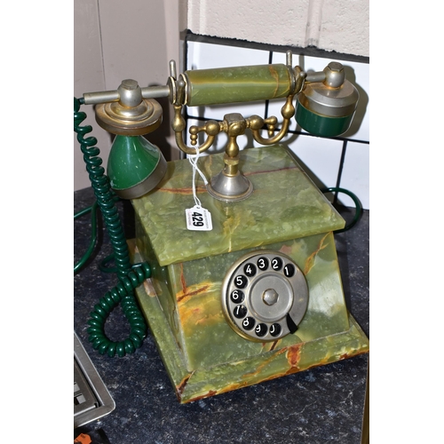 429 - A GREEN ONYX TELEPHONE, label to base reads 'Onix Telephone, Pietrasanta, Made in Italy', rotary dia... 