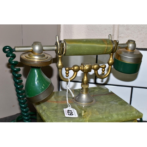 429 - A GREEN ONYX TELEPHONE, label to base reads 'Onix Telephone, Pietrasanta, Made in Italy', rotary dia... 