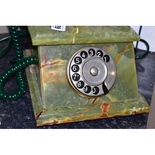 429 - A GREEN ONYX TELEPHONE, label to base reads 'Onix Telephone, Pietrasanta, Made in Italy', rotary dia... 