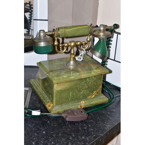 429 - A GREEN ONYX TELEPHONE, label to base reads 'Onix Telephone, Pietrasanta, Made in Italy', rotary dia... 