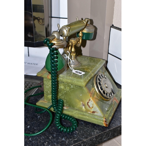 429 - A GREEN ONYX TELEPHONE, label to base reads 'Onix Telephone, Pietrasanta, Made in Italy', rotary dia... 