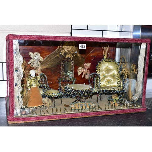 433 - A LATE NINETEENTH CENTURY DIORAMA, depicting a sitting room scene with figure, dog and furniture, he... 