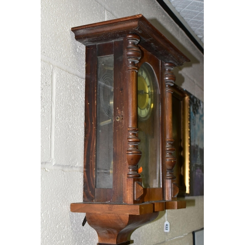 434 - TWO CLOCKS, comprising a Victorian black slate mantel clock of architectural form, chapter ring havi... 