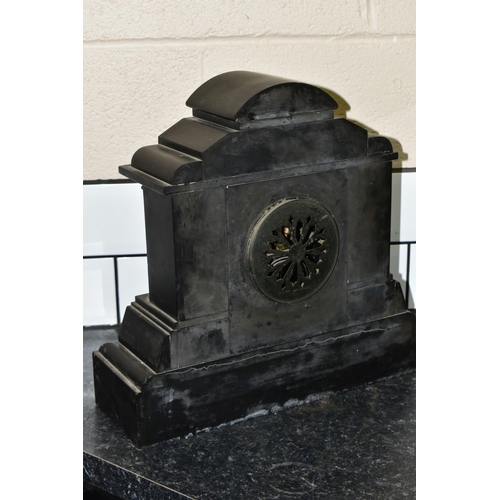 434 - TWO CLOCKS, comprising a Victorian black slate mantel clock of architectural form, chapter ring havi... 