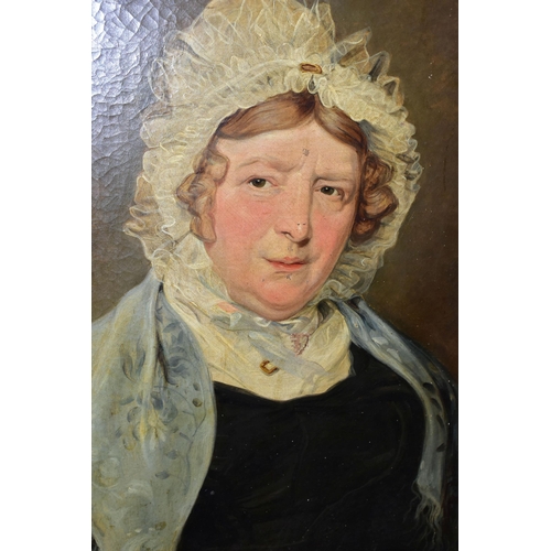 448 - A MID 19TH CENTURY HEAD AND SHOULDERS PORTRAIT OF A FEMALE FIGURE, she wears a lace bonnet on her he... 