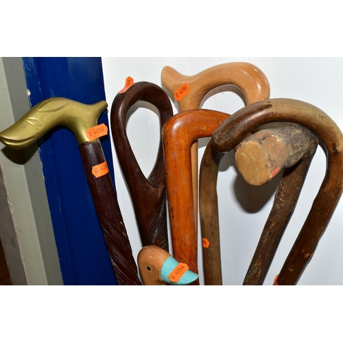 463 - A COLLECTION OF WALKING STICKS, HORSE CROP AND SWAGGER STICK, comprising a miliary swagger stick wit... 