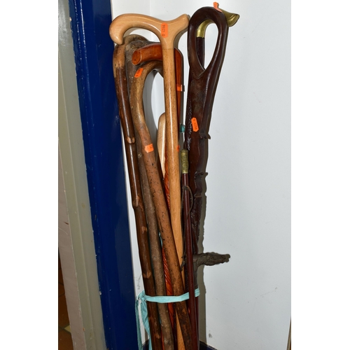 463 - A COLLECTION OF WALKING STICKS, HORSE CROP AND SWAGGER STICK, comprising a miliary swagger stick wit... 