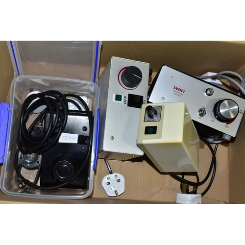 490 - A BOX CONTAINING MICROSCOPE POWER SUPPLY UNITS, comprising a Watson illumination unit with power sup... 