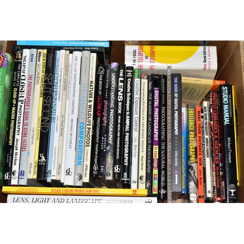 498 - FOUR BOXES OF PHOTOGRAPHIC BOOKS comprising approximately 130 titles in hardback and paperback forma... 